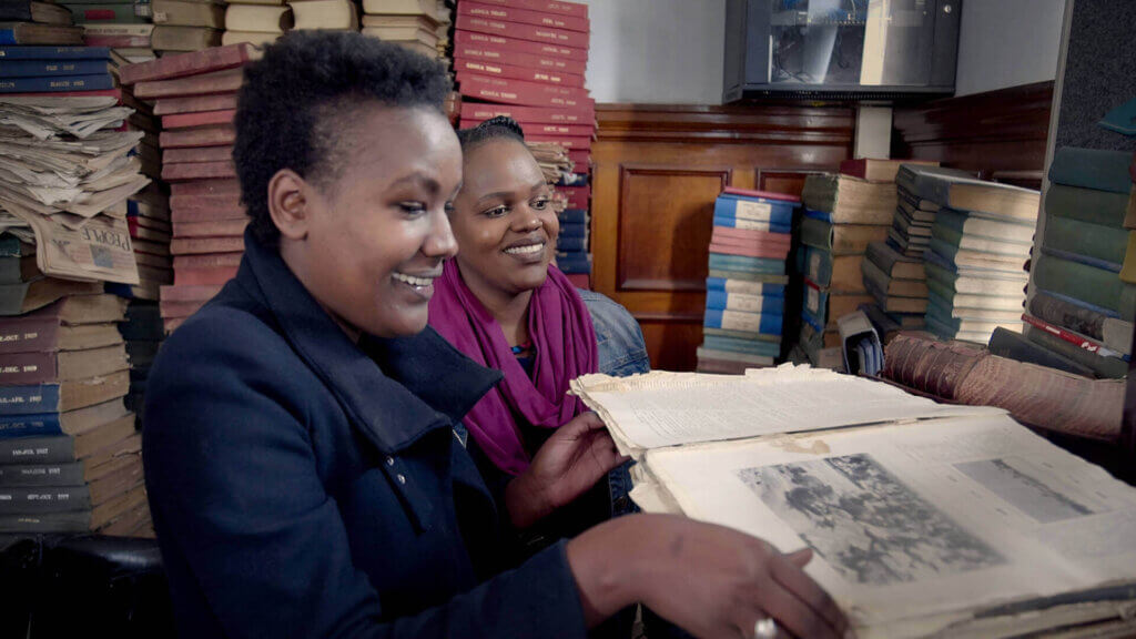 Angela Wachuka and Shiro Koinange inside Nairobi’s McMillan Memorial Library, featured in How to Build a Library.