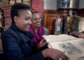 Angela Wachuka and Shiro Koinange inside Nairobi’s McMillan Memorial Library, featured in How to Build a Library.