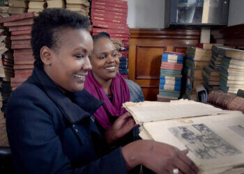 Angela Wachuka and Shiro Koinange inside Nairobi’s McMillan Memorial Library, featured in How to Build a Library.