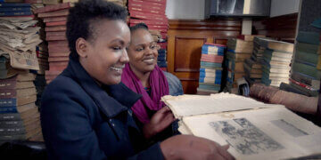 Angela Wachuka and Shiro Koinange inside Nairobi’s McMillan Memorial Library, featured in How to Build a Library.