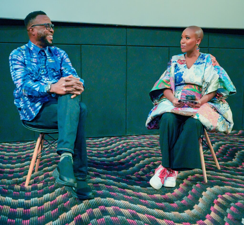Kenya's Nyokabi Macharia moderating a panel with Nigerian director Tolu Ajayi after the premiere of his film Over the Bridge in Nairobi.