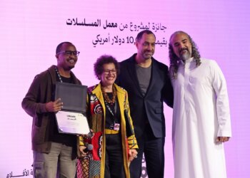 Tony Koros receiving the award for Money Town at the Red Sea Souk Awards.