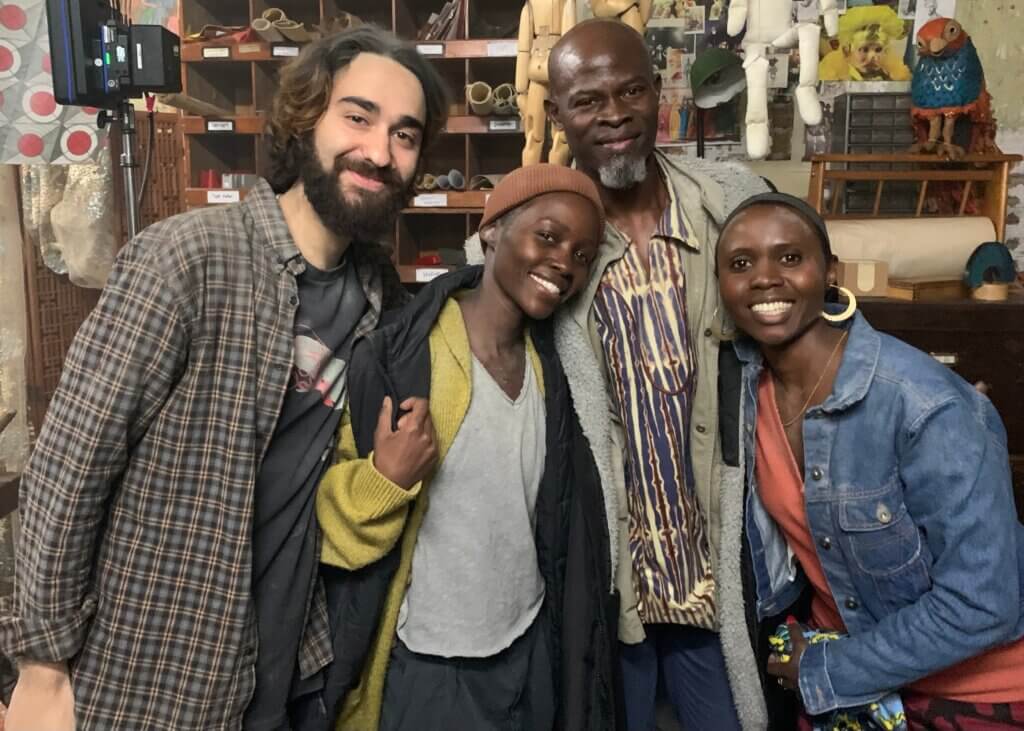 Eliane Umuhire with Lupita Nyong'o, Djimon Hounsou, and Alex Wolff on the set of 'A Quiet Place: Day One.'