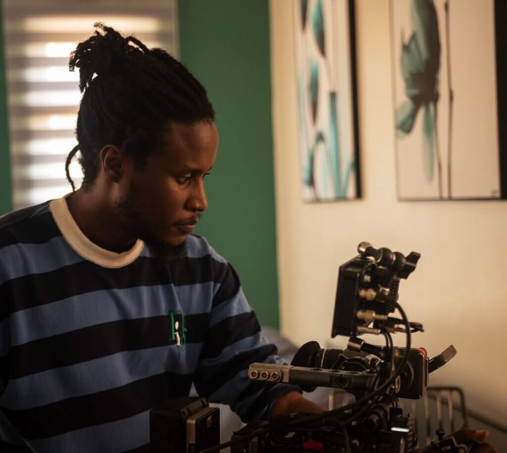 Ugandan filmmaker Loukman Ali on set.